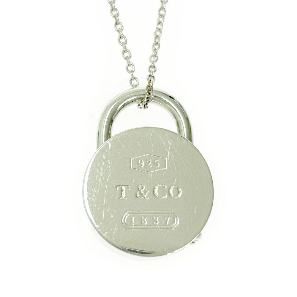 TIFFANY Co Silver Round Lock Necklace